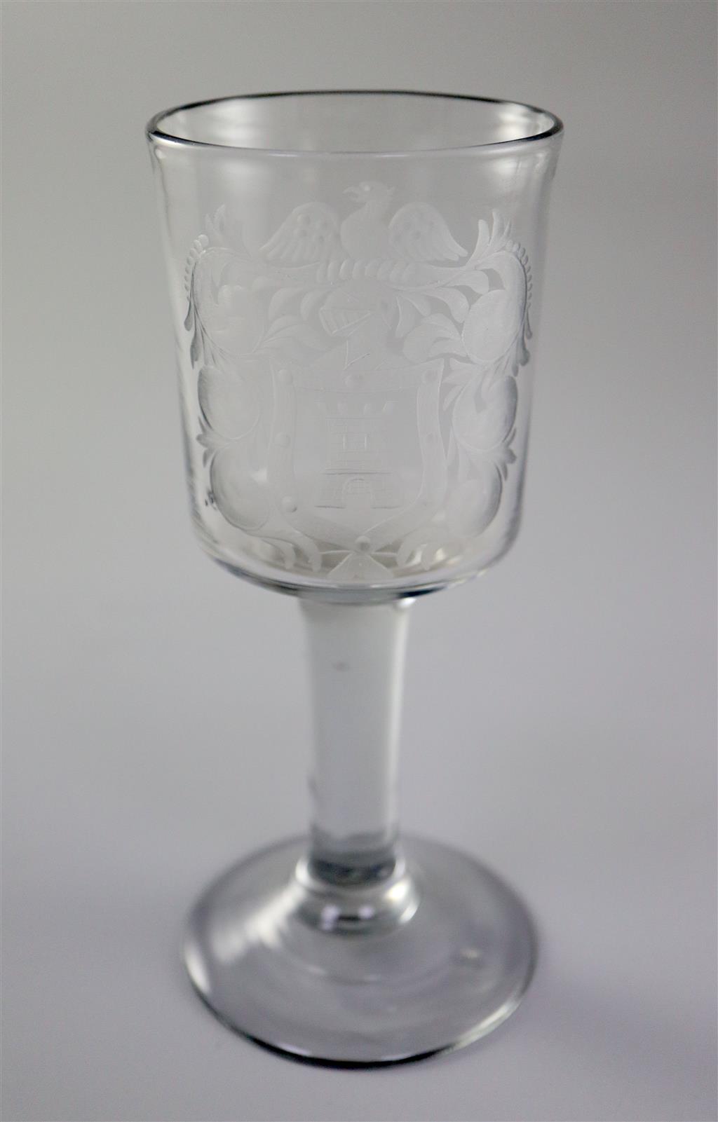 A George II plain stem armorial wine glass, c.1750, 16.5cm high